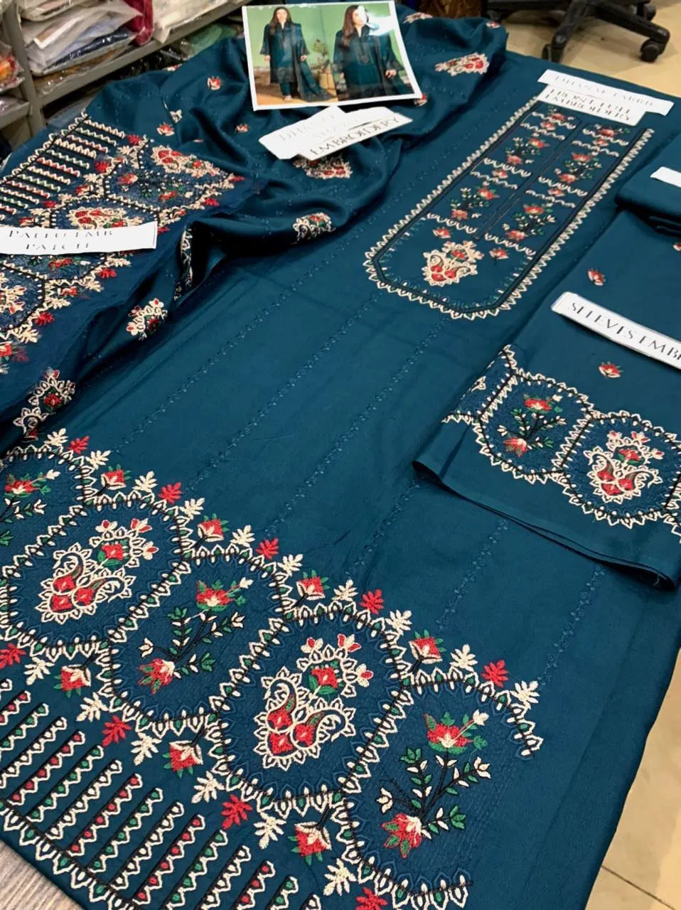 3 Pcs Women's Unstitched Embroidered Suit View Gallery - Pakistan