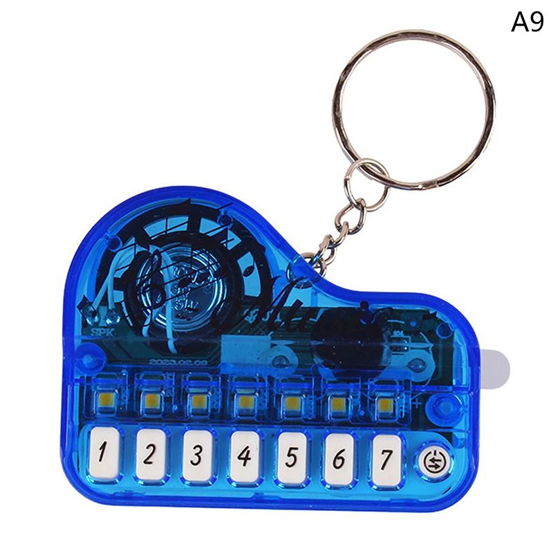 Portable Mini Piano Keychain Musical Toy - 8 Key Electronic Synthesizer Bag Charm, Interactive Birthday Gift & Party Favor - Random Colors View Gallery - Pakistan