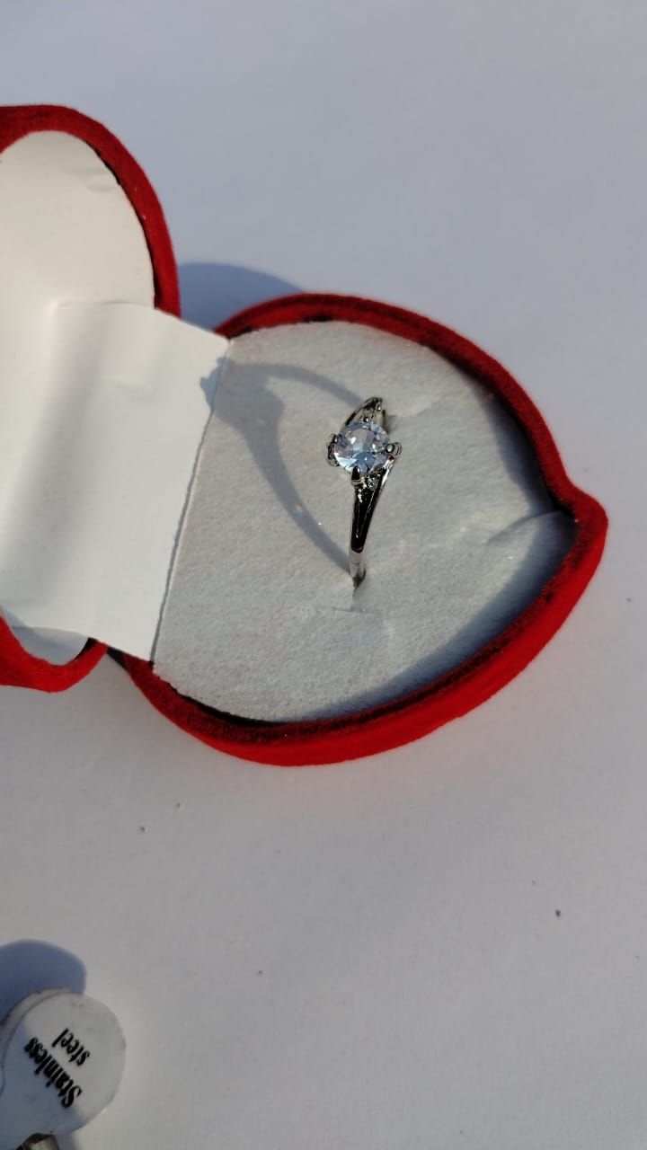 Elegant Stainless Steel Eternal Promise Couple Ring Set Featuring a Sparkling Solitaire Engagement Ring and a Sophisticated Modern Band for Lovers ( free size ) View Gallery - Pakistan