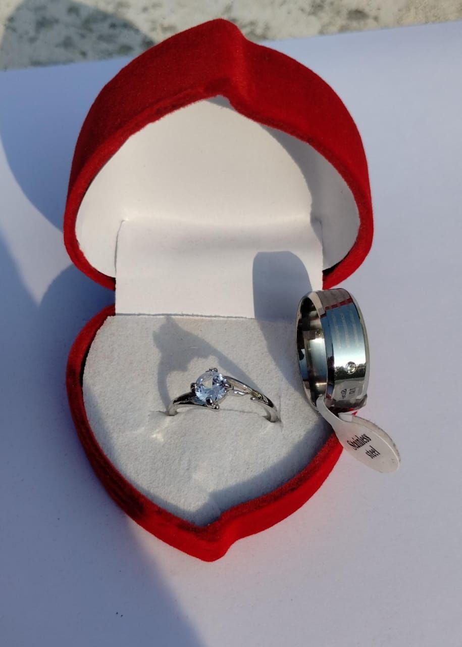 Elegant Stainless Steel Eternal Promise Couple Ring Set Featuring a Sparkling Solitaire Engagement Ring and a Sophisticated Modern Band for Lovers ( free size ) View Gallery - Pakistan