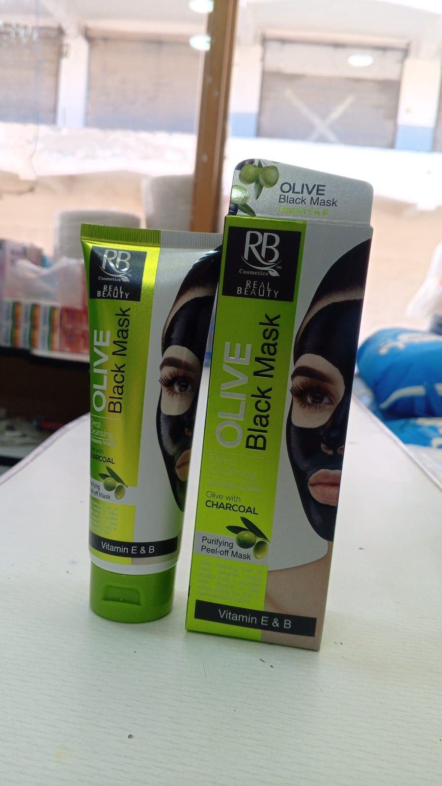 RB Cosmetics Real Beauty Olive & Charcoal Black Peel‑Off Mask | Deep Cleansing & Purifying Care | Original View Gallery - Pakistan