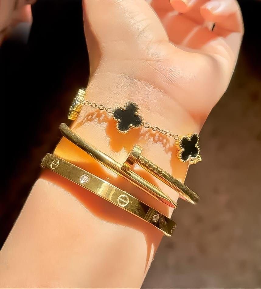 3 PC Stainless Steel Bangle Set for Women: Elegant Gold-Tone Stackable Jewelry. View Gallery - Pakistan