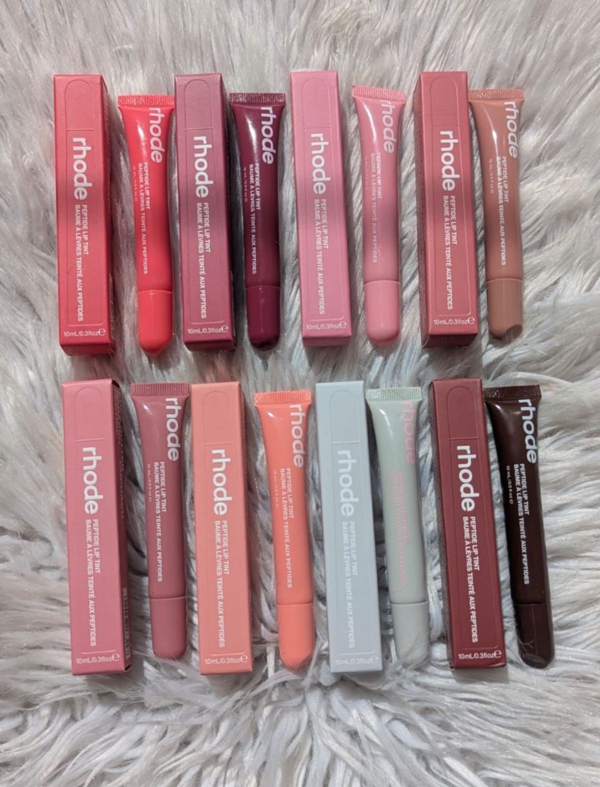 1 pcs only Rhode Peptide Lip Tint | Moisturizing Lip Glow Tint (Random Colour) View Gallery - Pakistan