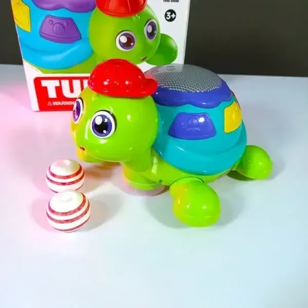 Blow the Ball Turtle Toy with Music & Lights – Fun Interactive Play for Kids View Gallery - Pakistan