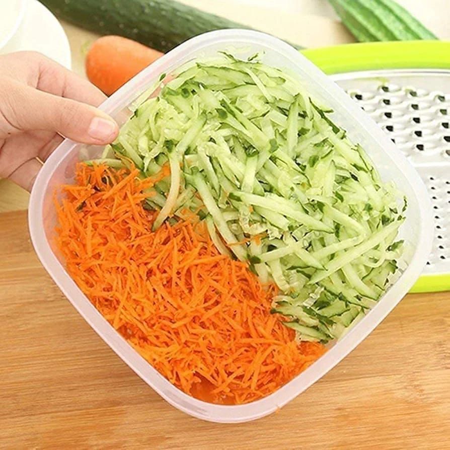 3-in-1 Cheese Grater with Storage Container, 3 Blades, Non-Stick Coating, Fruit & Vegetable Slicer Peeler-1Pc View Gallery - Pakistan