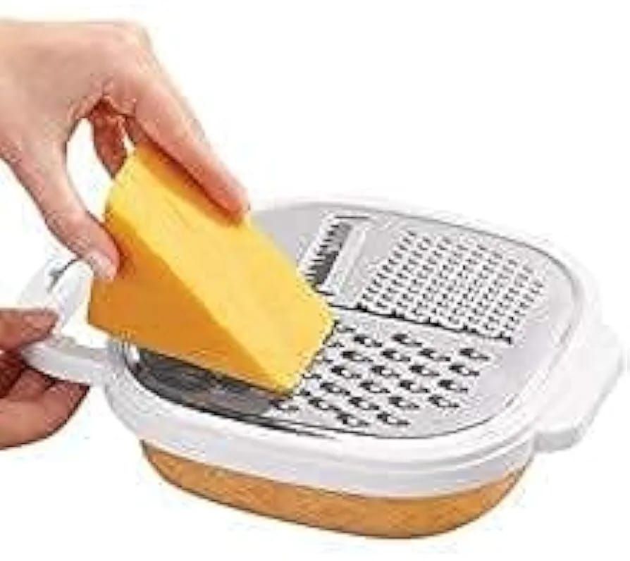 3-in-1 Cheese Grater with Storage Container, 3 Blades, Non-Stick Coating, Fruit & Vegetable Slicer Peeler-1Pc View Gallery - Pakistan