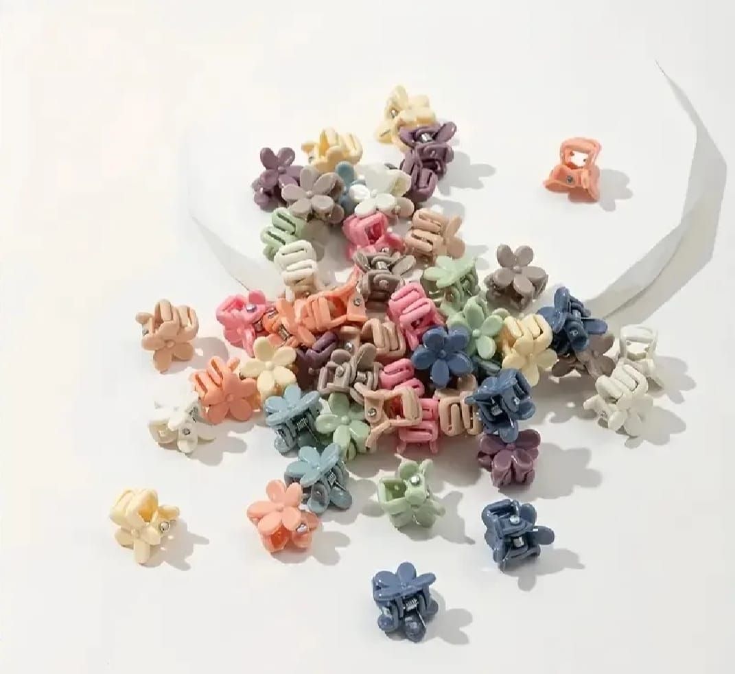 100 PCS Mini Flower Hair Claw Clips For Kids Assorted Colors Cute Plastic Hair Accessories Gentle Grip Non Slip Comfortable View Gallery - Pakistan