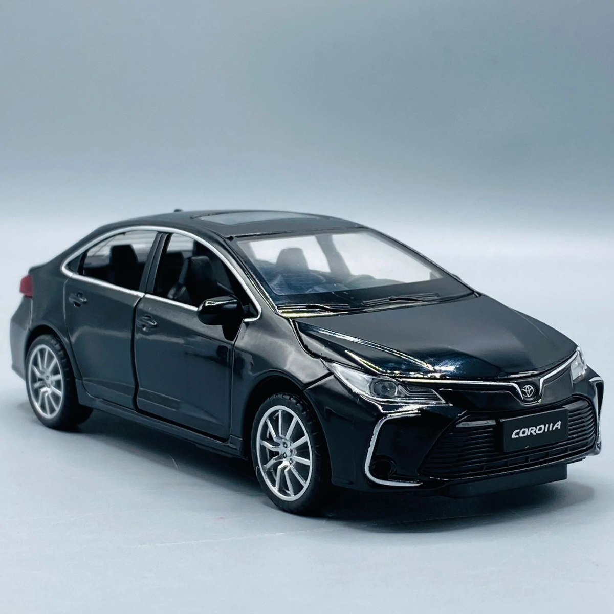 Corolla Toy Car with Smart Sensor Touch High-Quality Kids Toy Vehicle (Random Colors Available) View Gallery - Pakistan