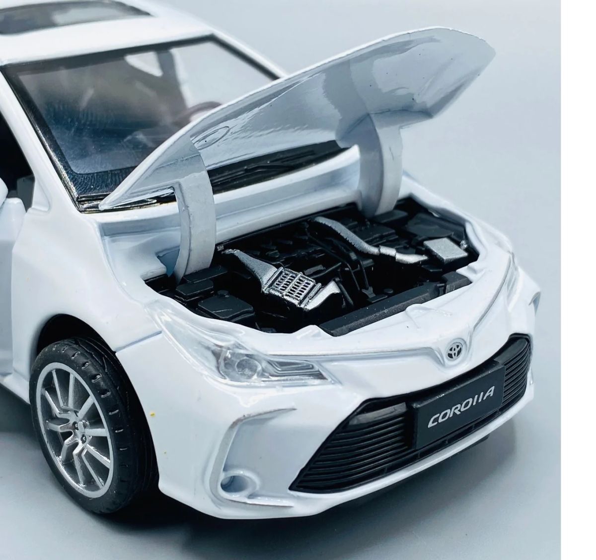 Corolla Toy Car with Smart Sensor Touch High-Quality Kids Toy Vehicle (Random Colors Available) View Gallery - Pakistan