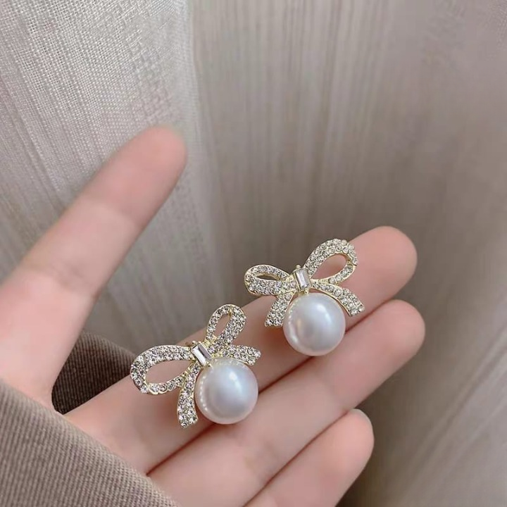 Bow Knot Pearl Earrings with Zircon – Korean Style (PJX-113) View Gallery - Pakistan