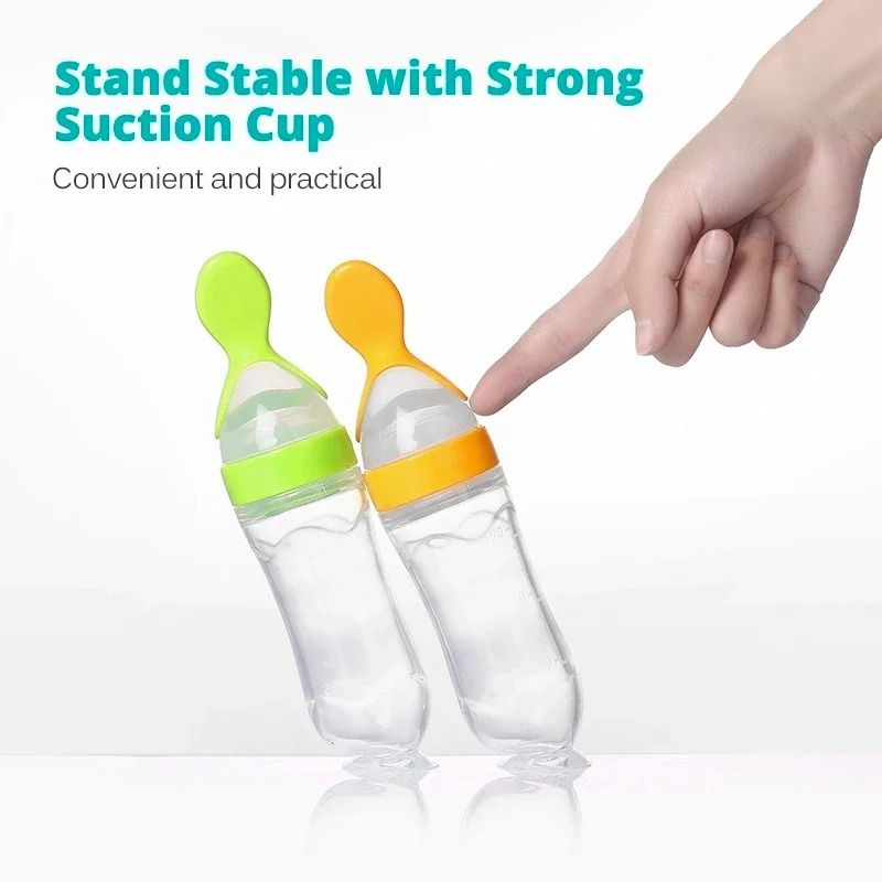 Silicone Baby Spoon Squeezing Feeding Bottle Feeder – Soft, Safe &amp; Easy Baby Food Dispenser (Random color) View Gallery - Pakistan
