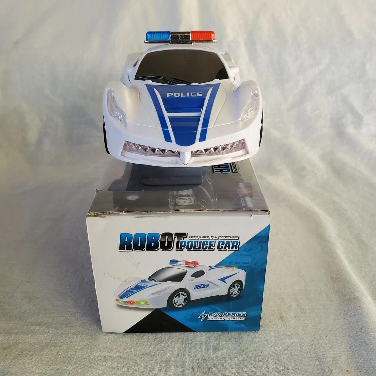 Robot Police Car Toy – Transformer with Lights, Music, Automatic Rotation &amp; Bump-and-Go Movement, Brain Development &amp; Fun Play for Kids View Gallery - Pakistan