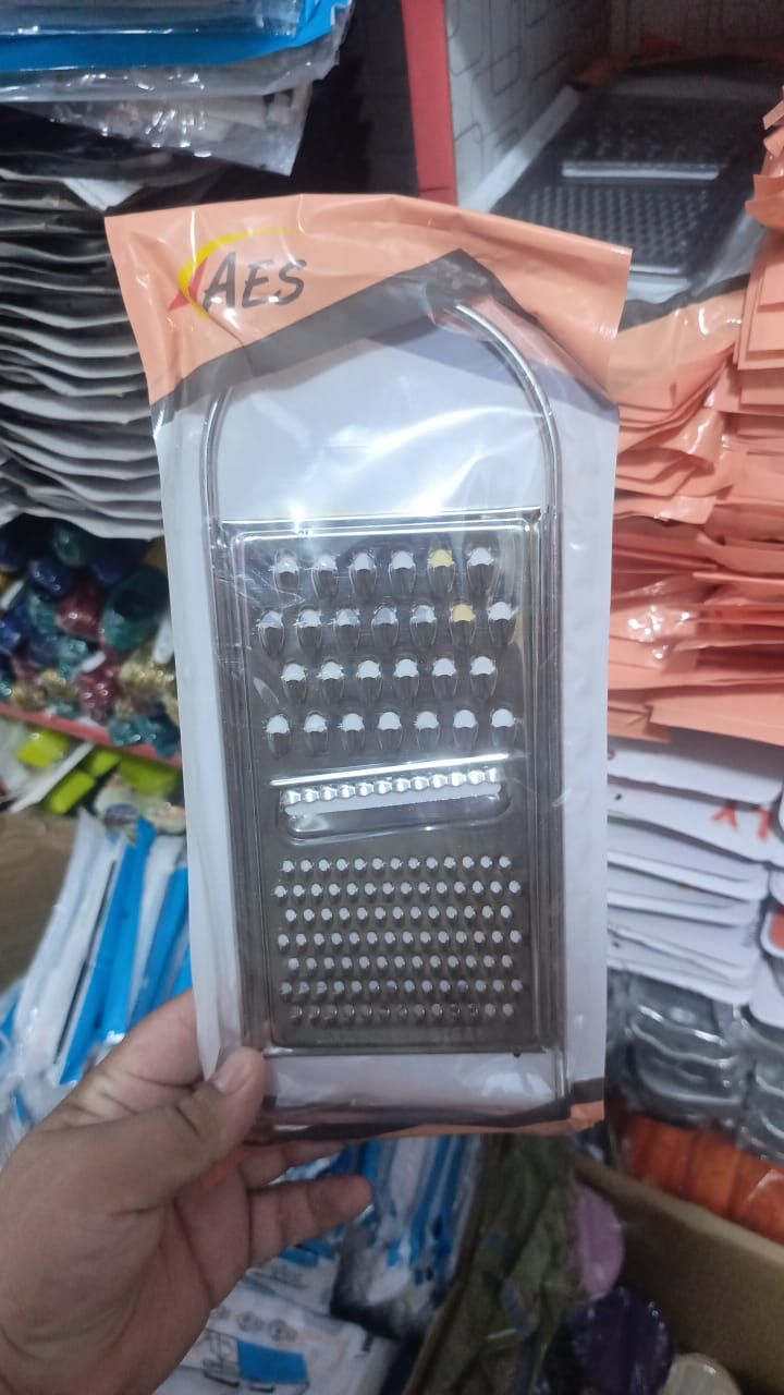 Stainless Steel Flat Grater with Sharp Teeth – Multi-Purpose Kitchen Peeler &amp; Slicer for Fruits, Vegetables, Cheese, Citrus Zesting, Food Prep, Durable &amp; Easy to Clean Tool View Gallery - Pakistan