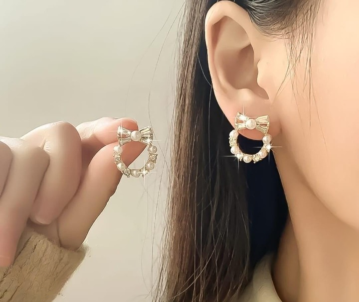 Pearl Bow Korean Zircon Earrings for Women – Elegant Bowknot Design with Sparkling Zircon and Pearl Accents | Premium Golden and Silver Fashion Jewelry for Weddings, Parties, and Everyday Wear | AXT-100 View Gallery - Pakistan