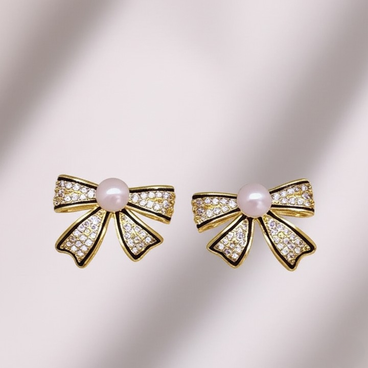 PJT-995 Bow Shape Zircon Pearl Earrings for Women – Korean Style Jewelry with Sparkling Zircon &amp; Classic Pearl Center | Available in Golden &amp; Silver | Perfect Gift for Parties, Weddings &amp; Everyday Fashion View Gallery - Pakistan