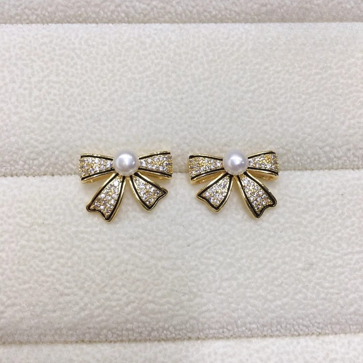 PJT-995 Bow Shape Zircon Pearl Earrings for Women – Korean Style Jewelry with Sparkling Zircon &amp; Classic Pearl Center | Available in Golden &amp; Silver | Perfect Gift for Parties, Weddings &amp; Everyday Fashion View Gallery - Pakistan