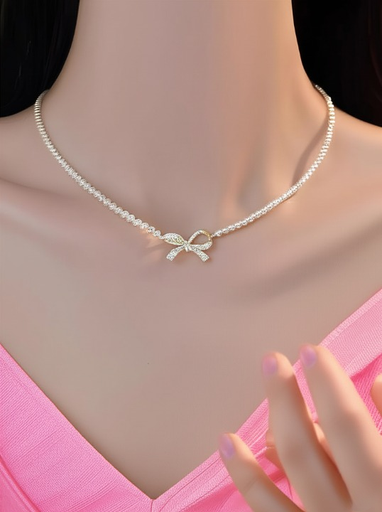 PQT-992 - Bow Shape Pearl Pendant Necklace for Women – Dainty Jewelry with Sparkling Bow Design | Available in Silver &amp; Golden Finish | Perfect Gift for Weddings, Parties &amp; Everyday Glamour View Gallery - Pakistan