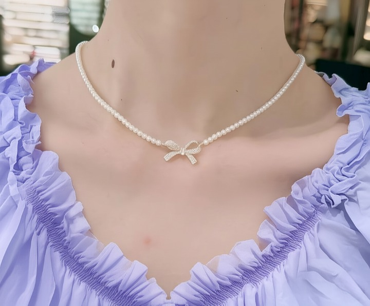 PQT-992 - Bow Shape Pearl Pendant Necklace for Women – Dainty Jewelry with Sparkling Bow Design | Available in Silver &amp; Golden Finish | Perfect Gift for Weddings, Parties &amp; Everyday Glamour View Gallery - Pakistan