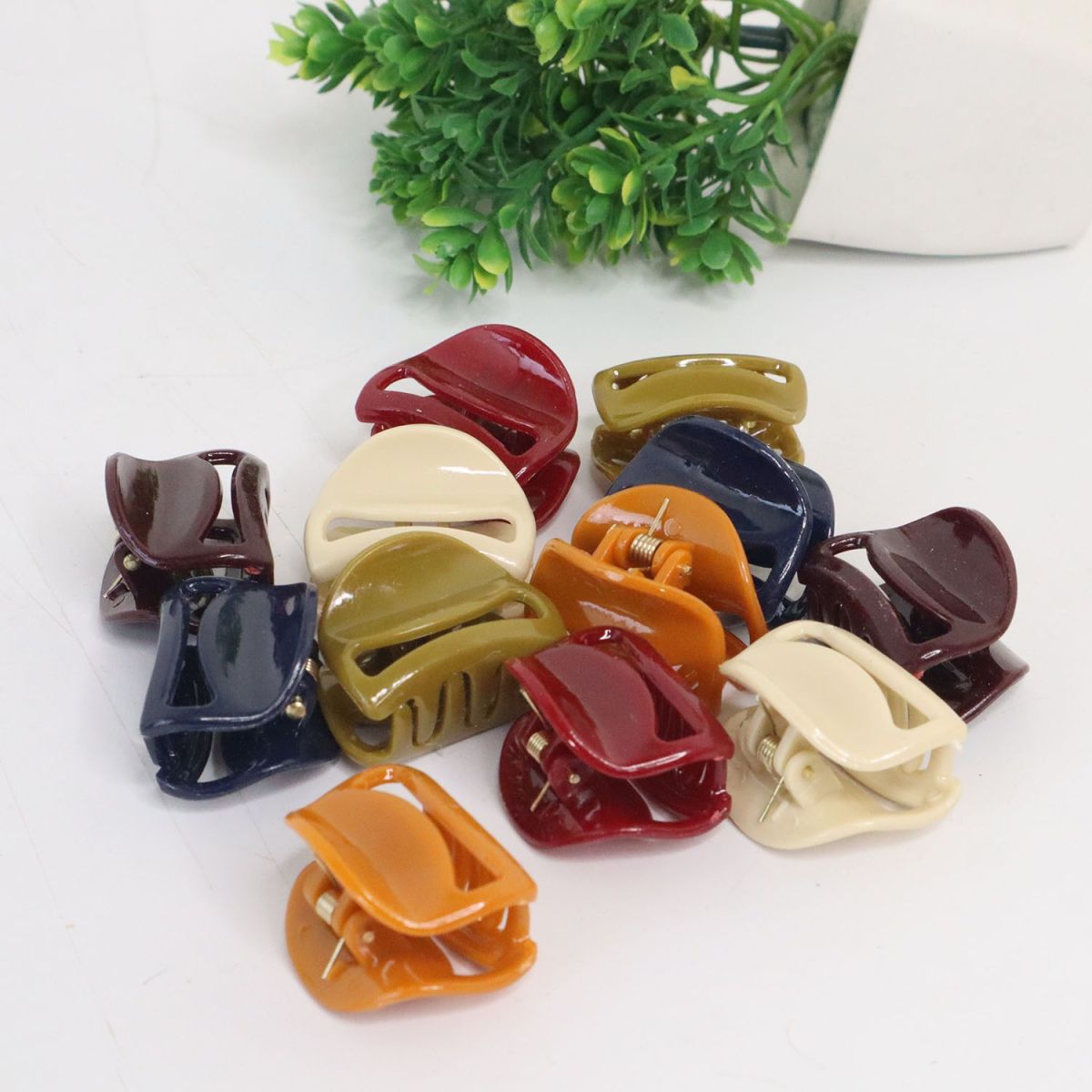 Pack of 12 Hair Catchers – Small Size (1 Inch) Multicolor Plastic Clips for Women &amp; Girls | Strong Grip &amp; Stylish Design (Random Color) View Gallery - Pakistan