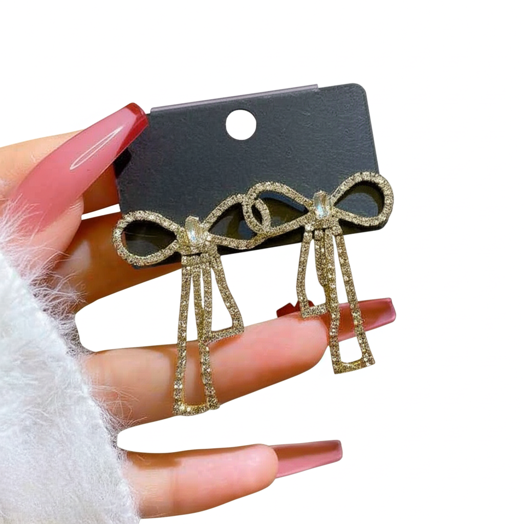 PQT-985 Touch Of Glamour To Your Look With These Bow Shape Zircon Korean Earrings – Color Golden View Gallery - Pakistan