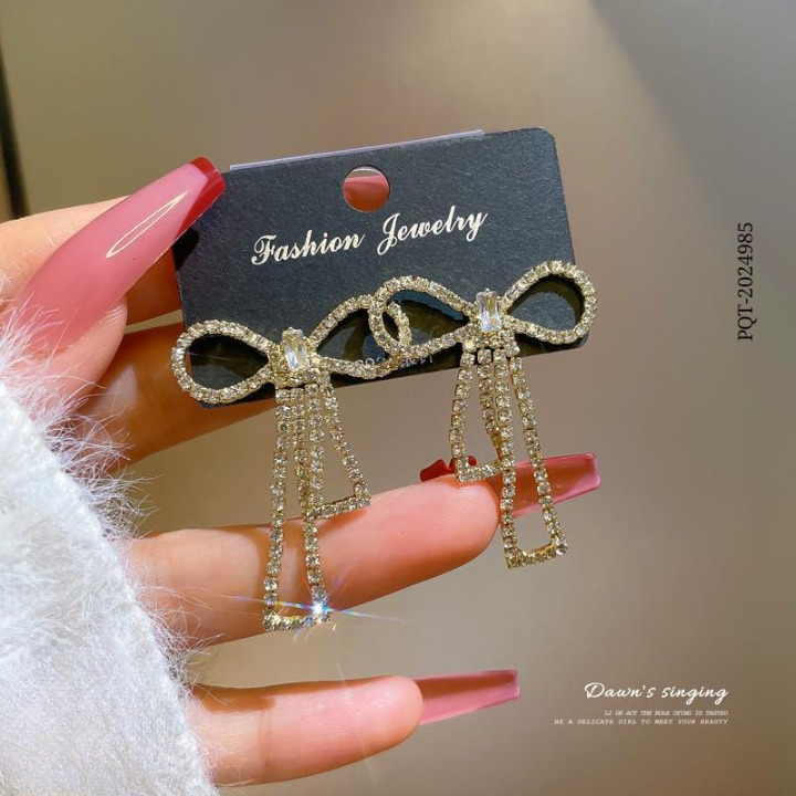 PQT-985 Touch Of Glamour To Your Look With These Bow Shape Zircon Korean Earrings – Color Golden View Gallery - Pakistan