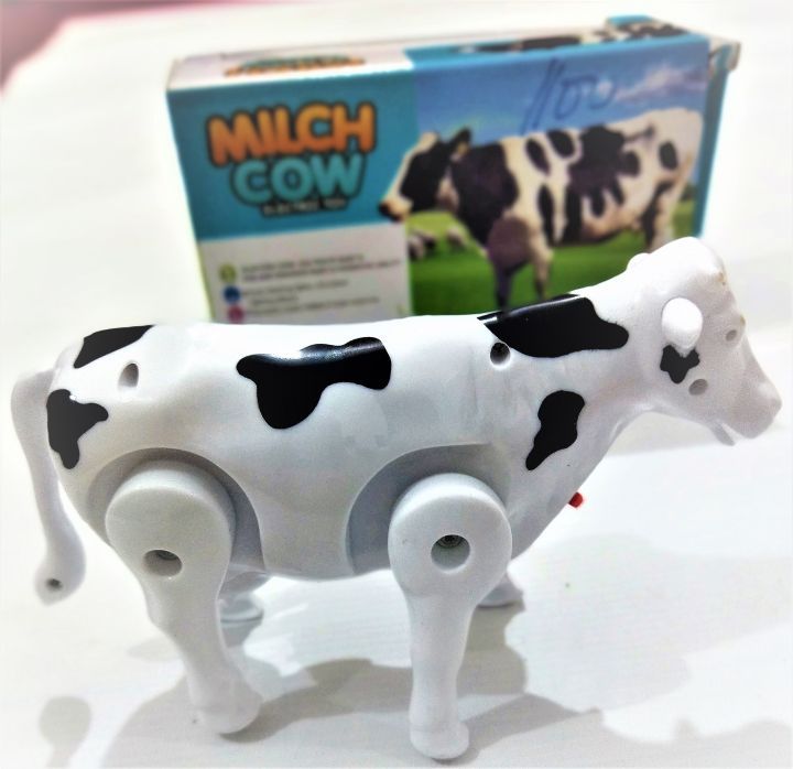 Funny Walking Musical Milch Cow Toy for Kids – Black &amp; White Electric Animal with Lights, Sound &amp; Moving Tail View Gallery - Pakistan