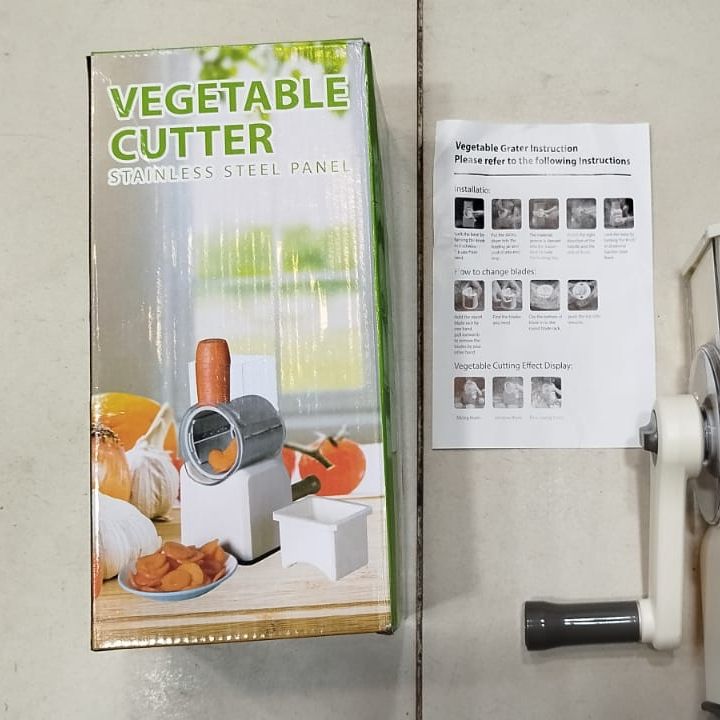 Vegetable Cutter Stainless Steel | Manual Vegetable Cutter Slicer &amp; Grater | Multi-Functional Kitchen Gadget ( Random Color ) View Gallery - Pakistan