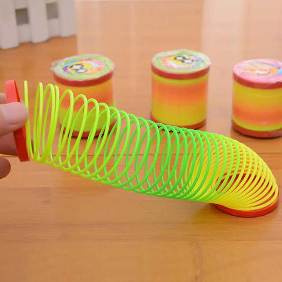 Magic Slinky Rainbow Springs Bounce Fun Toy For Kids | Magic Rainbox Spring View Gallery - Pakistan