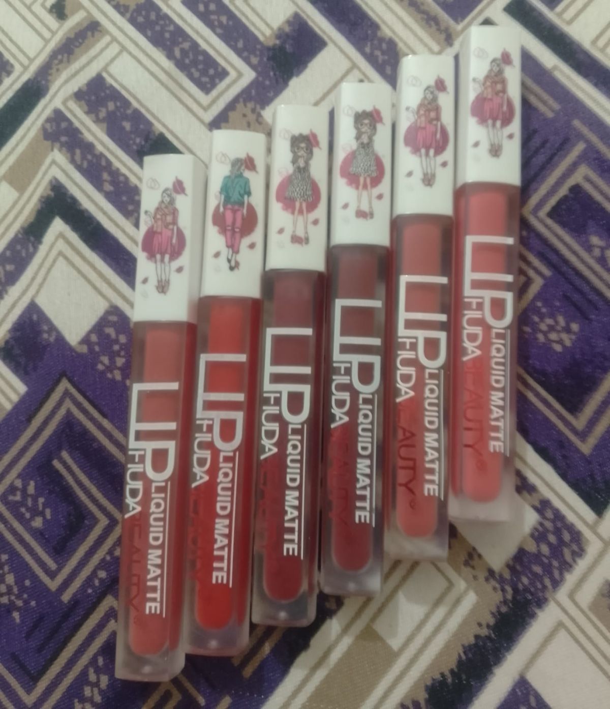 6-Piece Matte Lip Gloss Set – Multicolor Shades, Long-Lasting Liquid Formula, Velvet Finish - Random Shades (without box) View Gallery - Pakistan