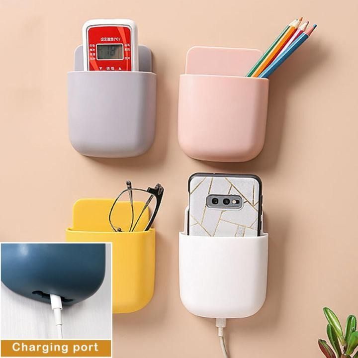 1 Pcs U Shape Wall Mounted Mobile And Remote Holder | Wall Mounted Storage Case for Remote, Toothbrush, Mobile Phone Plug Holder | Multifunctional Storage Holder (random color) View Gallery - Pakistan
