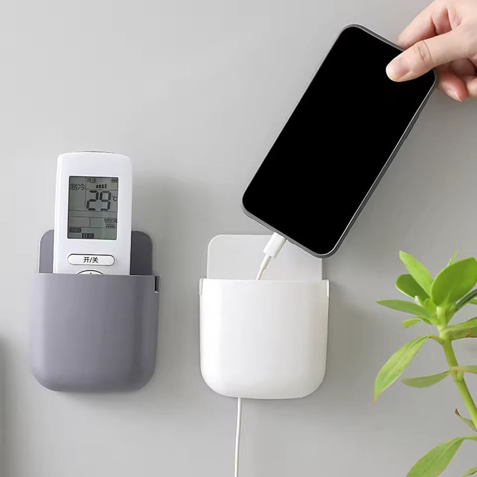 1 Pcs U Shape Wall Mounted Mobile And Remote Holder | Wall Mounted Storage Case for Remote, Toothbrush, Mobile Phone Plug Holder | Multifunctional Storage Holder (random color) View Gallery - Pakistan
