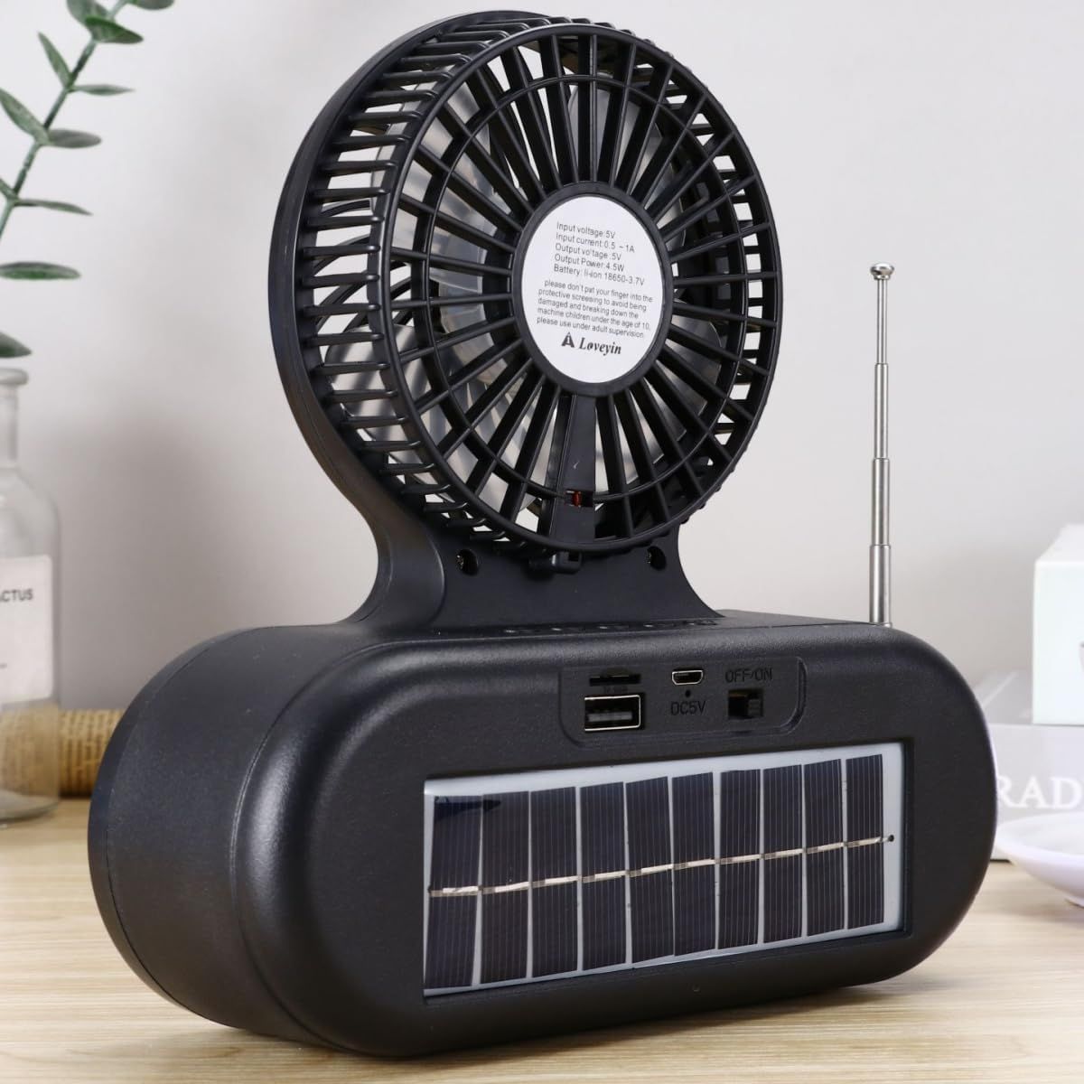 Solar fan Bluetooth speaker | Wireless outdoor portable With  blowing flashlight | Listening to music Support TF card U disk FM radio TWS interconnection View Gallery - Pakistan