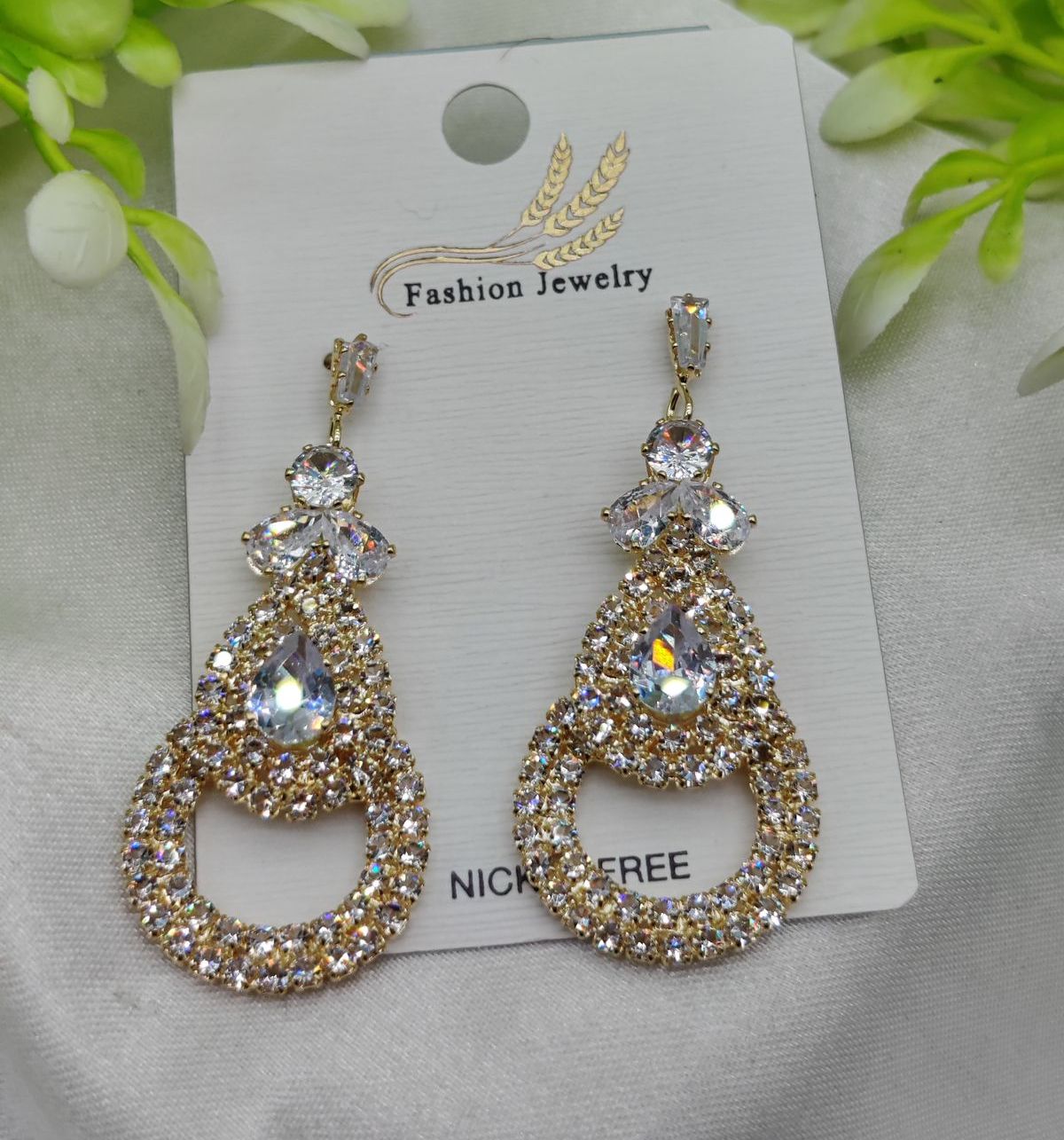 Imported Glamorous Crystal-Studded Teardrop Earrings – Nickel Free Earrings - Luxurious Gold Finish | Best Quality Artificial Earrings For Girls &amp; Women View Gallery - Pakistan