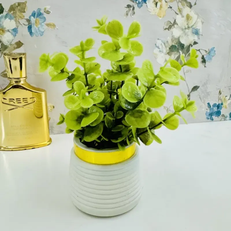 Artificial eucalyptus planter  Tree Decoration Piece / Elevate your home’s elegance with stunning artificial flowers. View Gallery - Pakistan