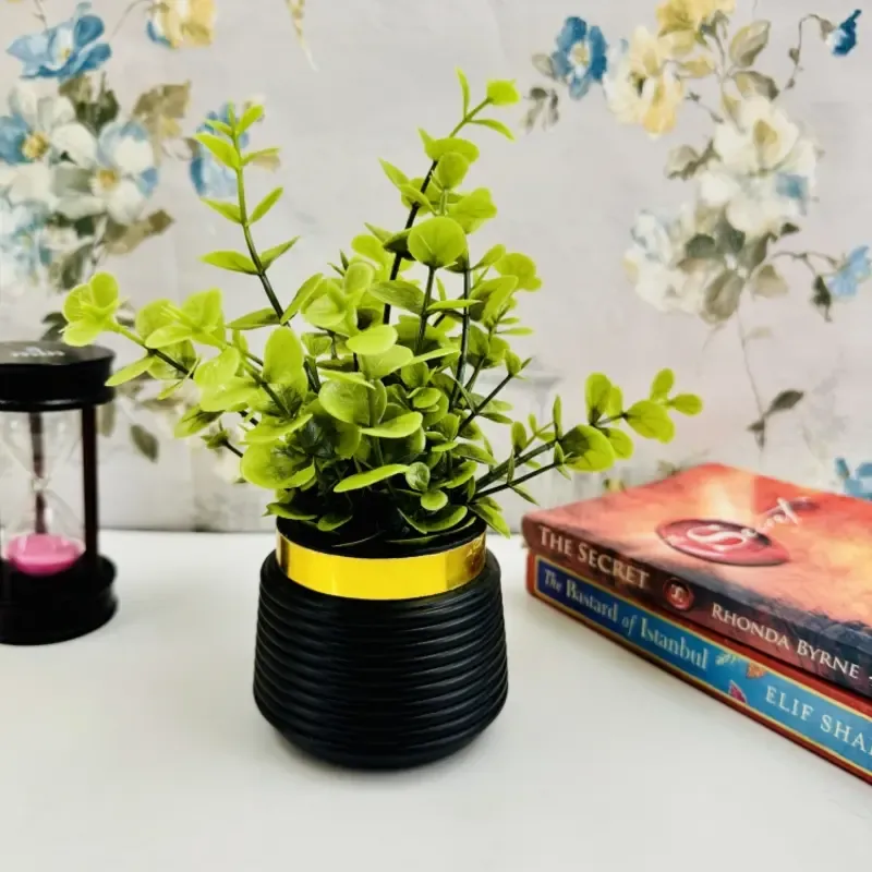 Artificial eucalyptus planter  Tree Decoration Piece / Elevate your home’s elegance with stunning artificial flowers. View Gallery - Pakistan