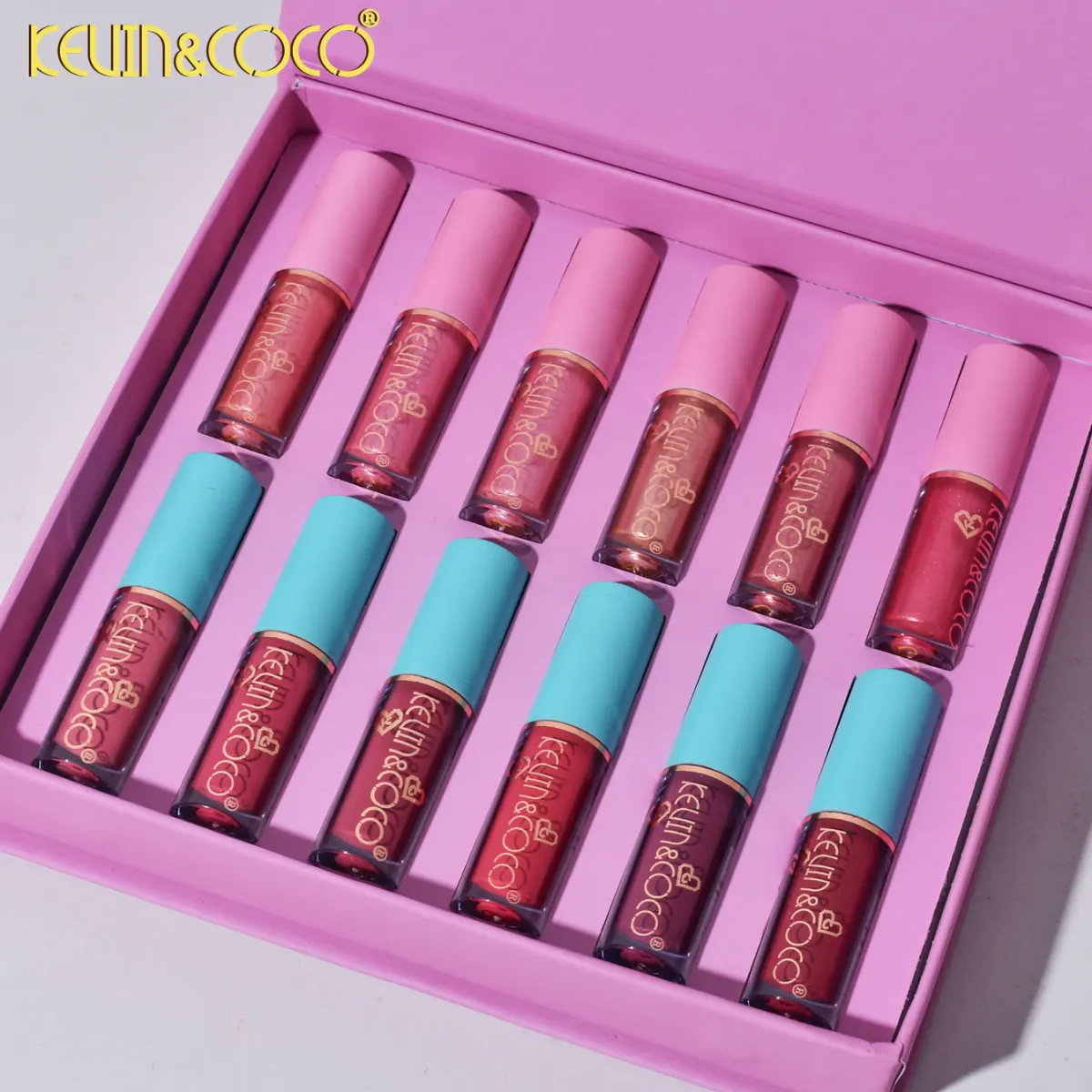 Set 12 Lip Gloss Kevin&amp;amp;Coco, nuante de rosu si rose, cutie dreptunghiulara, 26.5x16.5x2.2 cm, 200 g, multicolor