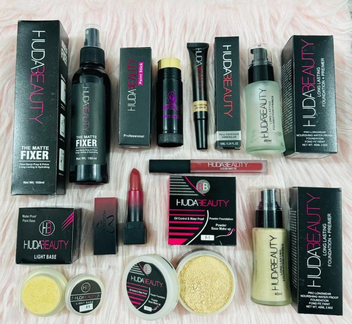 Huda Beauty Deal Pack Of 9 best deal for girls (Makeup Fixer , Stick Concealer ,Primer , Lipstick) View Gallery - Pakistan