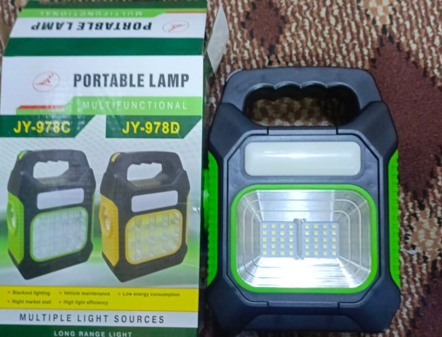 JY-978A Solar portable lamp multi functional for outdoor Hiking long Range light(random color) View Gallery - Pakistan