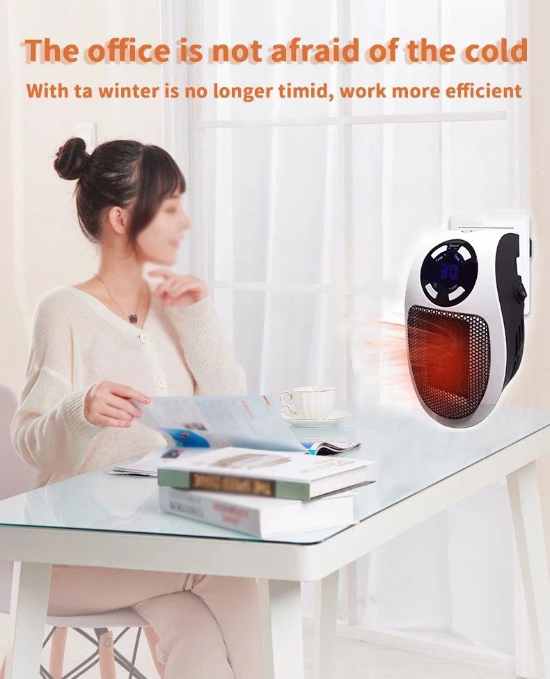 Portable Electric Heater Fan Heater Electric Ceramic Fan Energy-Saving Heater Safe Quiet Heating Fan room for Winter. View Gallery - Pakistan