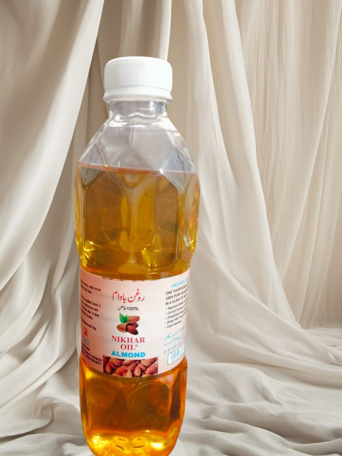 Nikhar Sweet almond oil / good for the skin and hair View Gallery - Pakistan