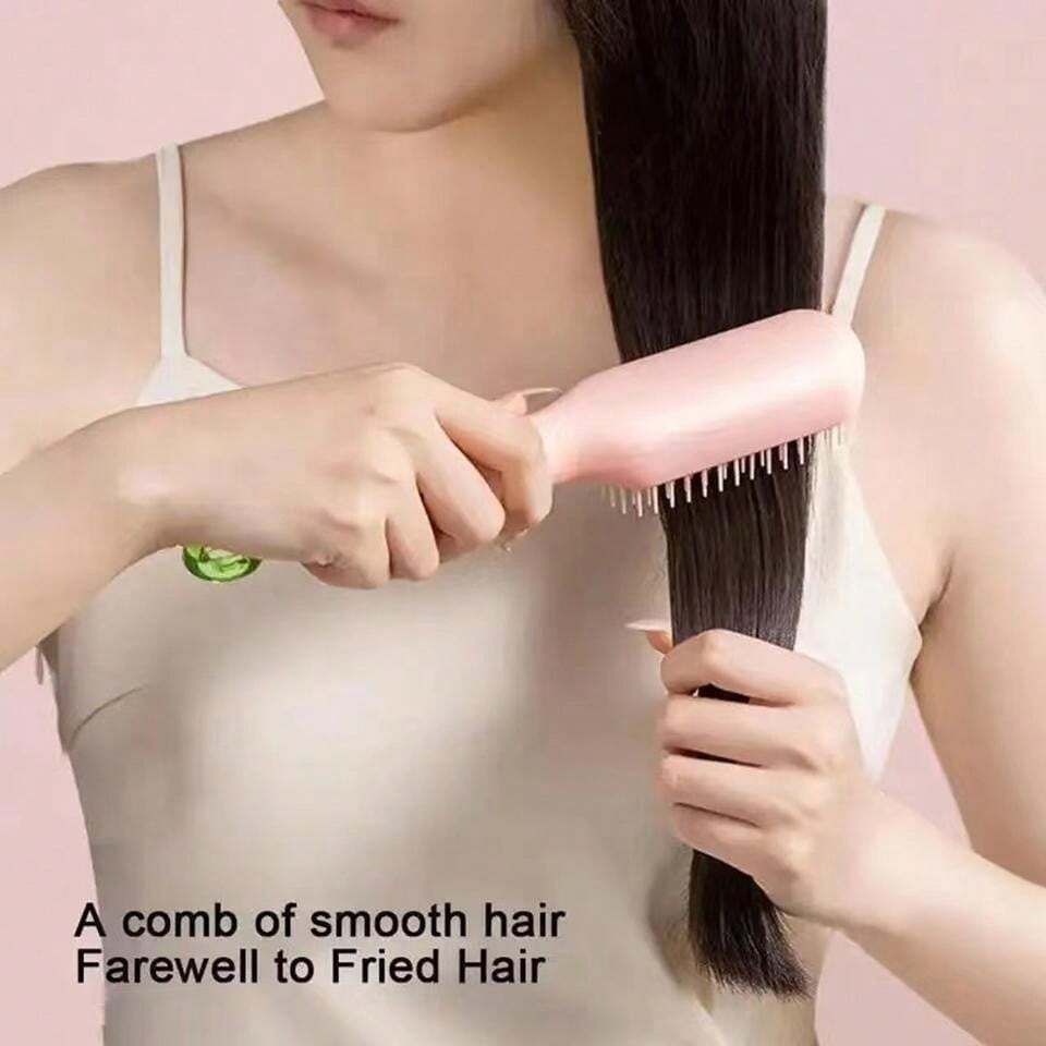 Self cleaning hair comb (random color) View Gallery - Pakistan
