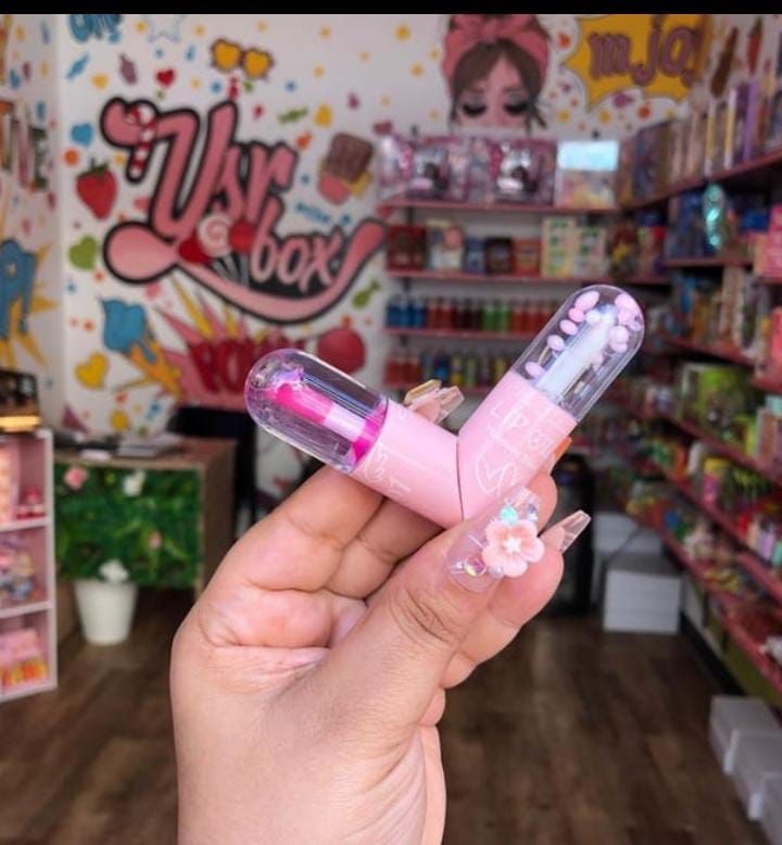 2 in 1 lip balm + lip shiner (random color) View Gallery - Pakistan