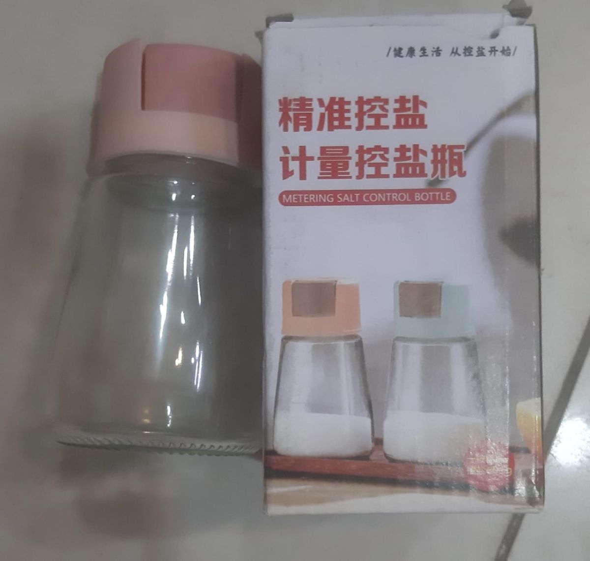 Sealed Seasoning quantitative Bottle salt pepper condiment Dispenser Glass Spice Jar | Salt Control Bottle Press - 180ml (random color) View Gallery - Pakistan