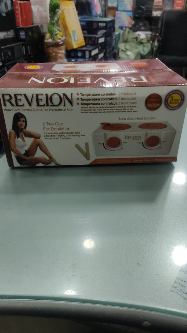 Reveion body Double Wax Warmer Electric Wax Warmer Professional Machine for Hair Removal. View Gallery - Pakistan