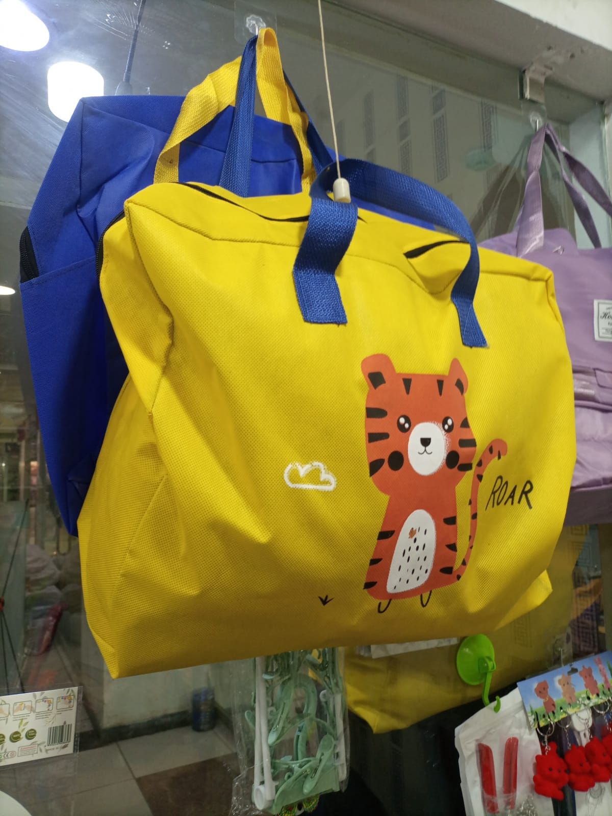 Baby Dinosaur Cloth Organizer And Storage Handbag Portable | only blue color available. View Gallery - Pakistan