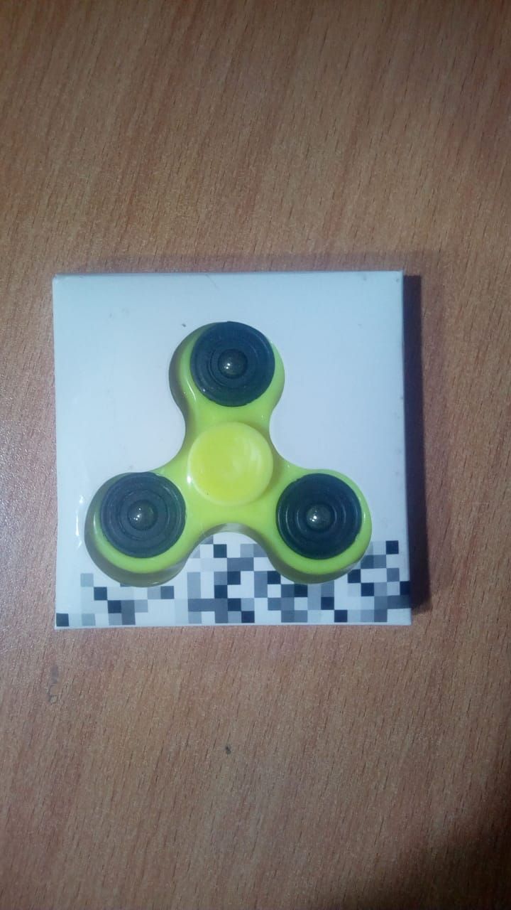 Fidget Spinner Stress Reducer Toy Metal Barring Multi Color. View Gallery - Pakistan