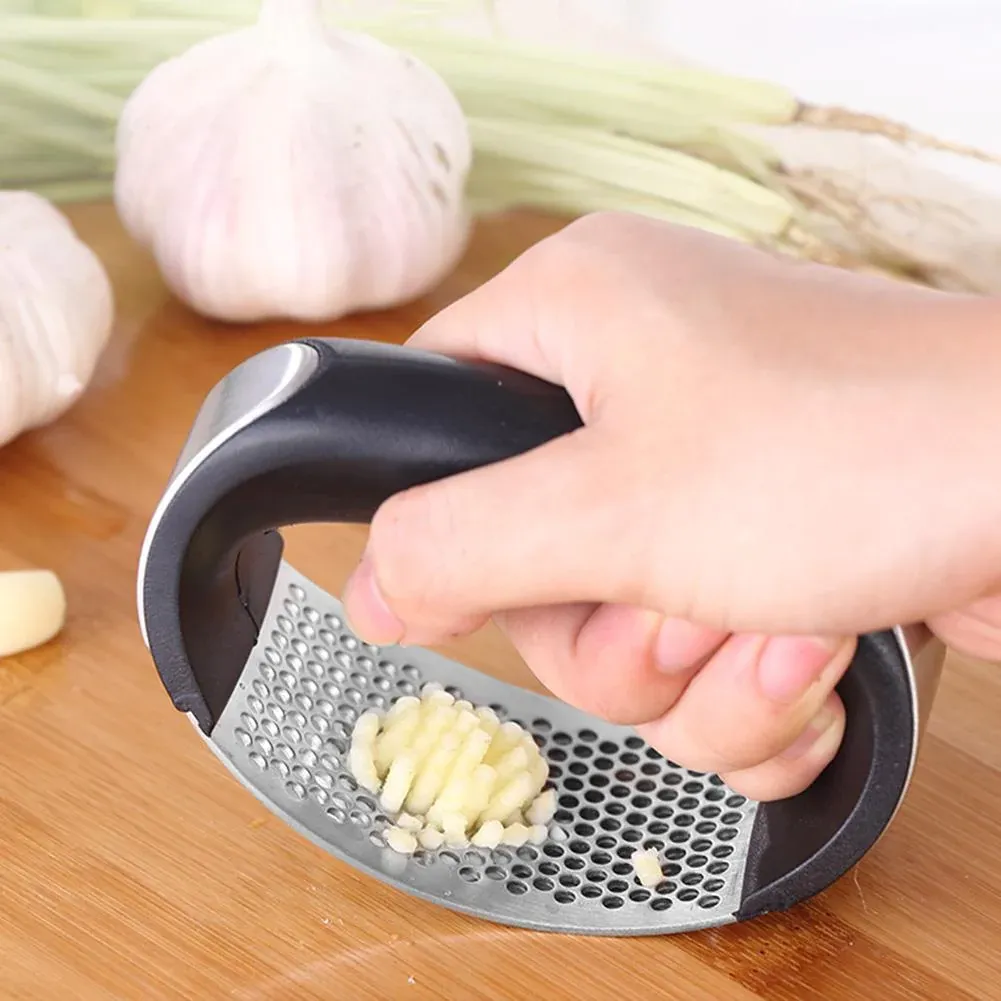 Manual Garlic Press Stainless Steel Handheld Ginger Garlic Curve Mincer Chopping (Random Color) View Gallery - Pakistan