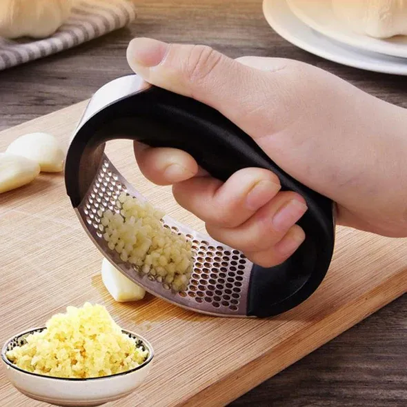 Manual Garlic Press Stainless Steel Handheld Ginger Garlic Curve Mincer Chopping (Random Color) View Gallery - Pakistan