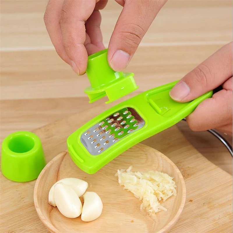 Garlic Press Grater Slicer Plastic Grinding Tool Kitchen Accessories(random color ) View Gallery - Pakistan