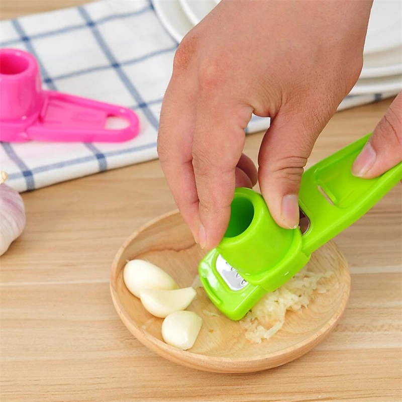 Garlic Press Grater Slicer Plastic Grinding Tool Kitchen Accessories(random color ) View Gallery - Pakistan
